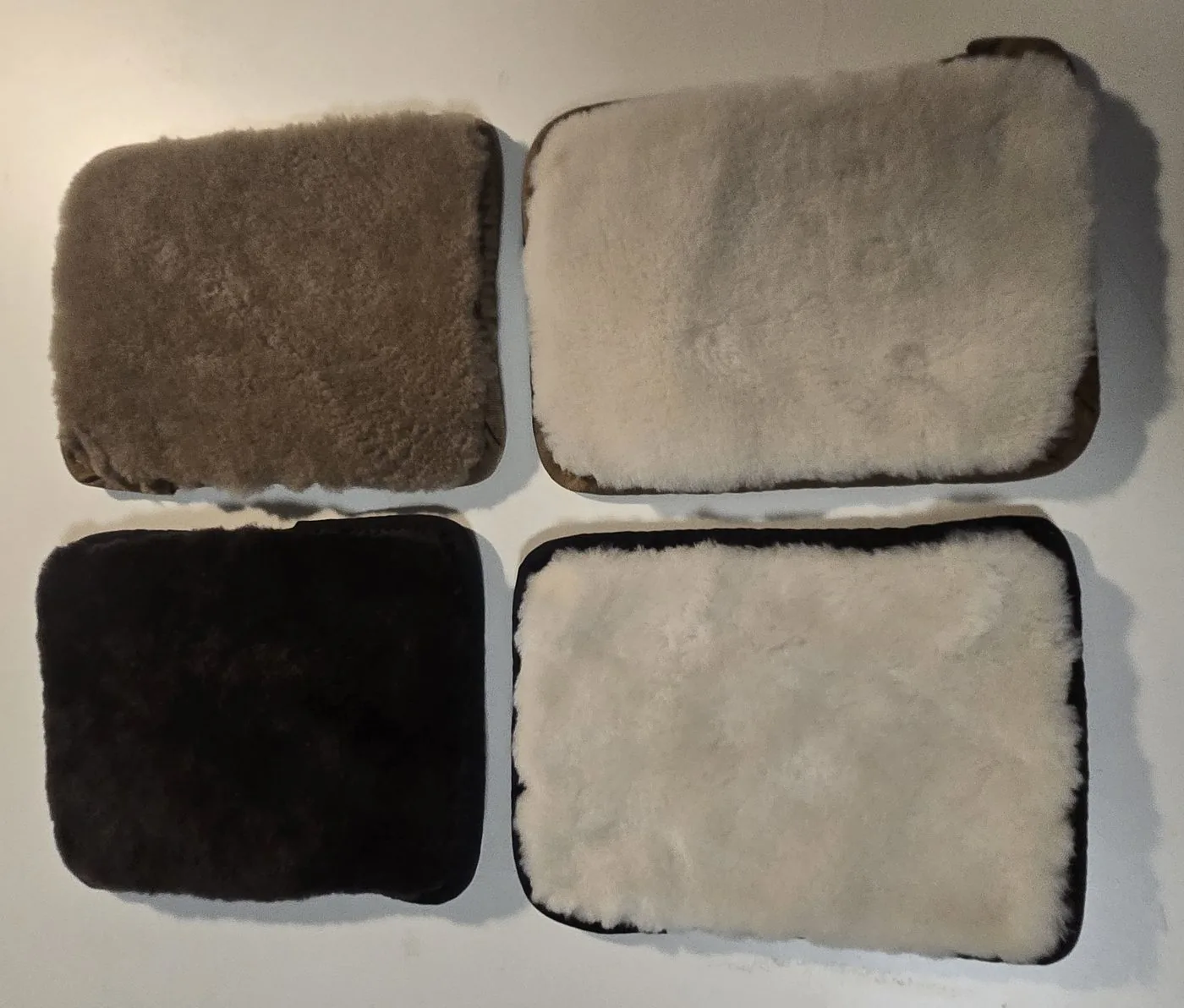 Wrist pads in five sheepskin colors